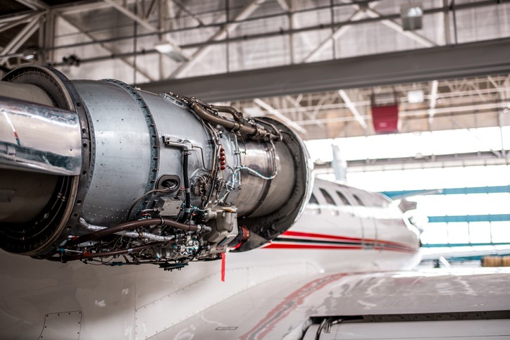 Engine aircraft opened for maintenance and installation of custom metal enclosures
