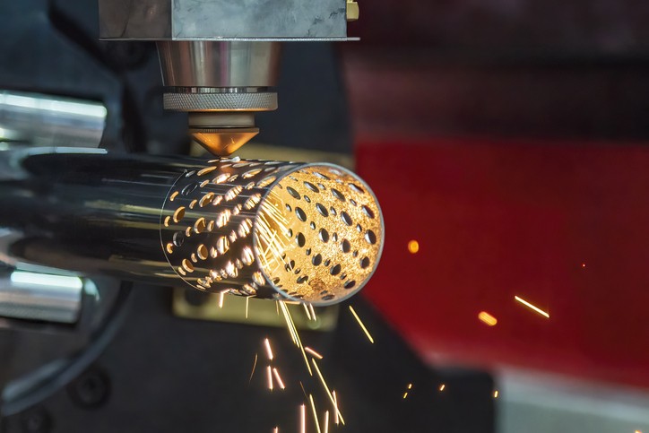 The fiber laser cutting machine cutting machine cut the stainless steel tube. The hi-technology sheet metal manufacturing process by laser cutting machine.