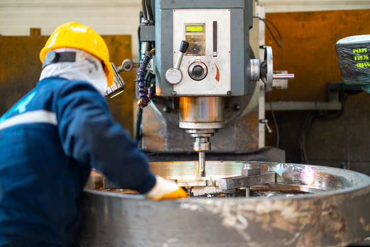 Manufacturing worker working inside the factory